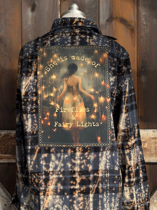 She is made of fireflies and fairy Lights flannel- distressed black