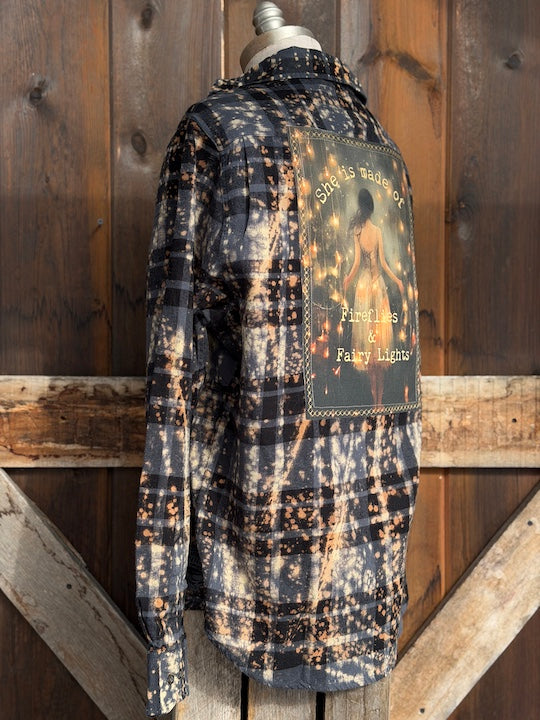 She is made of fireflies and fairy Lights flannel- distressed black